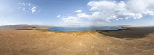 Aerial view, Vast empty landscape at the mountain lake Song Kul in autumn