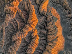 Aerial view, View from above, Canyon runs through landscape, Dramatic barren landscape of eroded hills, Badlands, Canyon of the Forgotten Rivers, Issyk Kul, Kyrgyzstan, Asia