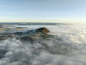 Aerial view of the wintry and fog-covered Hegaulandschaft shortly after sunrise