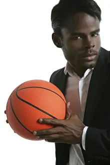 Category Historic EN Prints: African american young businessman basketball ball in white studio