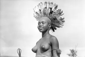 African woman with feather plume