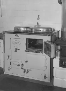 The AGA cooker. A swedish invention by Gustaf Dalen with the principle of heat storage, a combination of two large hotplates and two ovens into one unit, the AGA cooker