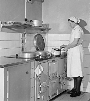 The AGA cooker. A swedish invention by Gustaf Dalen with the principle of heat storage, a combination of two large hotplates and two ovens into one unit, the AGA cooker