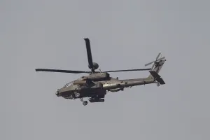 Agusta Westland AH-64 Apache helicopter aircraft in British Army air corps colours flying