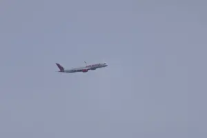 Aircraft of Air India airways in flight in a blue sky