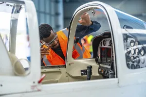 Aircraft engineer wearing safety glasses