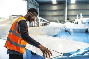 Aircraft maintenance engineer wearing safety glasses