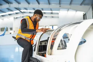 Aircraft maintenance engineer wearing safety glasses