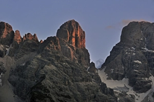 Alpenglow at sunset over the mountain Monte Cristallo in the Dolomites