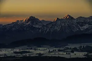 Alpine foothills at sunrise with Allgaeu mountains