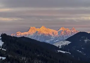 Alpine glow at sunset, mountain peaks of the Loferer Steinberge in winter
