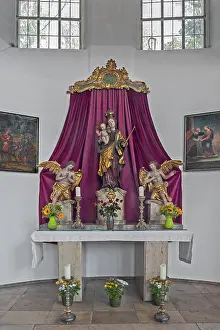Side altar with angels and floral decoration