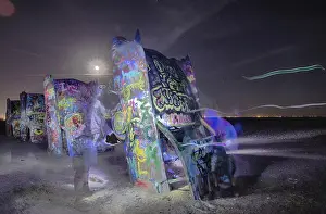 AMARILLO, TEXAS - April 2015: Famous art installation Cadillac Ranch at night
