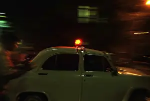 Category Historic EN Prints: Ambassador car with red siren top Bombay Mumbai