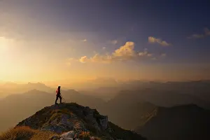 Ammer Mountains with climber at sunrise