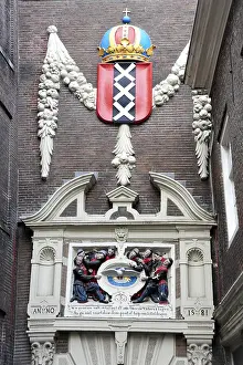 Amsterdam city coat of arms above the Weeshuispoort Tor