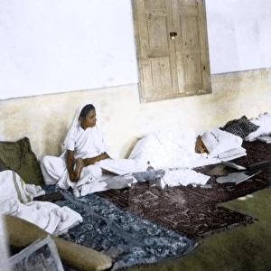 Amtus Salam massaging feet of Mahatma Gandhi, India, Asia, October 1938, Asia