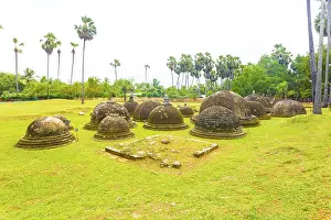 Framed Print : Ancient dagobas or stupas seen in middle of an archeolgical site thought to be an old Kadurugoda monastery in Chunnakam Framed Print : Ancient dagobas or stupas seen in middle of an archeolgical site thought to be an old Kadurugoda monastery in Chunnakam