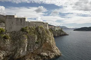 Ancient fortress on the cliff edge of Dubrovnik protects the port