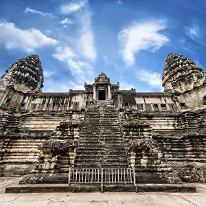 Ancient Khmer architecture. Angkor Wat temple under blue sky