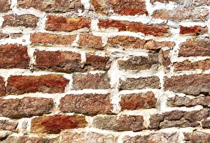 Framed Print : Ancient weathered rough stone wall as creative background
