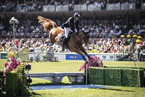 Category Historic EN Prints: Andre Thieme of Germany and riding DSP Chakaria compete in the first round of the 1