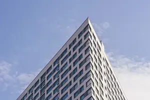 Angle of the Skyscraper on the Cloudy Sky Background