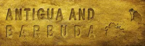 Antigua and Barbuda Map and Text on Grunge Gold Texture