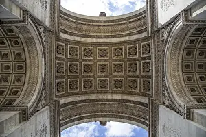 The Arc de Triomphe in Paris as seen from under the arc