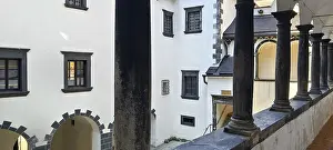 Arcades with dark columns and historic windows in the Schallaburg inner courtyard Mostviertel Lower Austria Austria