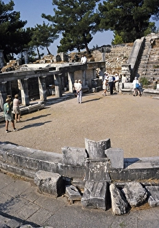 Archaeological site Ruins of the ancient Greek city of Priene, Turkey, 1997 Tourist group in the amphitheatre, Asia