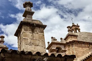 Architectural details of a church under a clear blue sky