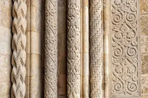 Architectural details at the portal of the romanesque old cathedral of Coimbra