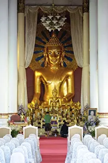 Arm chair and Buddha statue, Chiang Mai