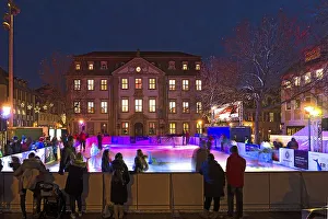Artificial skating rink in the evening illumination