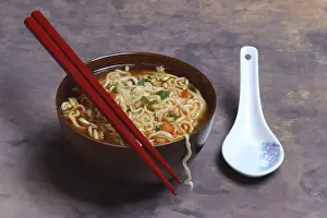 Asian noodle soup in bowl with chopsticks, Germany