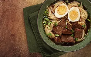 Asian noodles in broth, with beef and egg