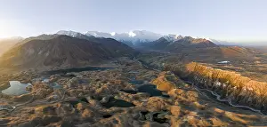 Atmospheric aerial view, high mountain landscape with glacier moraines and mountain lakes