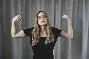 Behind every attractive woman is a strong man