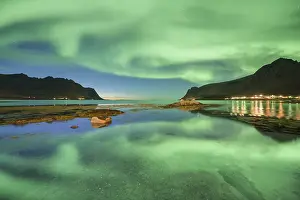 Aurora borealis reflected in the sea