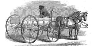 An automatic rein holder on the carriage of a team of horses