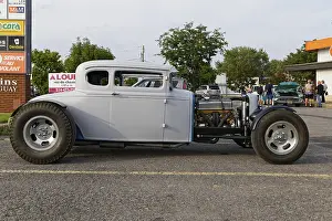 Automobile, car show, custom made vintage car with open engine display