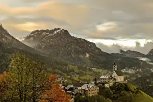 Framed Print : Autumn landscape with colorful trees and snowy mountains in the background in Dolomites
