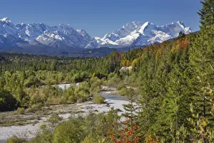 Autumn landscape in the Isar valley with Alpspitze and Zugspitze in the Wetterstein range