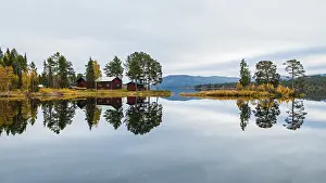 Autumnal landscape with lake, reflection