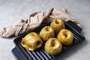 Baked apples on a rectangular baking sheet
