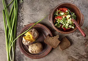 Baked potatoes, vegetable salad