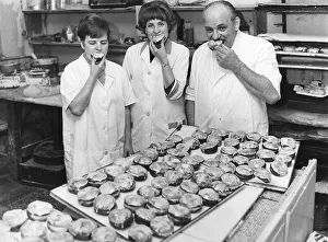 Baker and employees eat pancakes