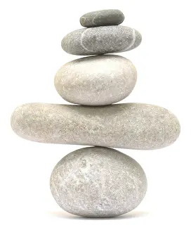 Balancing stone tower isolated on white background