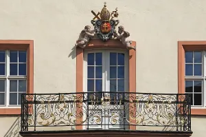 Balcony and ecclesiastical coat of arms on the abbey building of Sankt Marien from 1689
